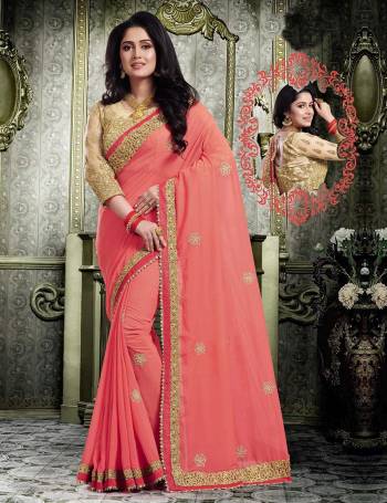 A Must Have Shade In Every Womens Wardrobe Is Here With This Designer Saree In Light Orange Color Paired With Beige Colored Blouse. This Pretty Saree Is Georgette  Based Paired With Art Silk Fabricated Blouse. Buy Now.