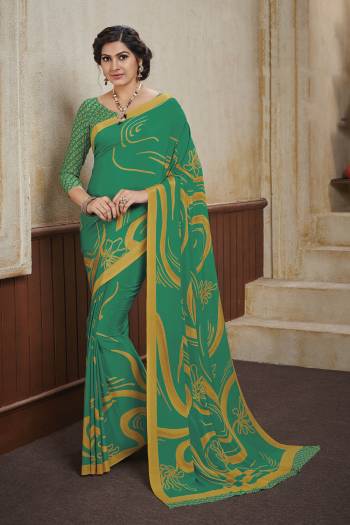 Add This Beautiful Saree To Your Wardrobe For Your Casuals Or Semi-Casual Wear. This Saree And Blouse Are Crepe Based Beautified With Prints. Grab It Now.