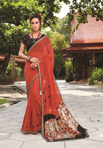 New Shade Is Here To Add Into Your Wardrobe With This Saree In Rust Orange Color Paired With Black Colored Blouse, This Saree Is Fabricated On Georgette Paired With Art Silk Fabricated Blouse.