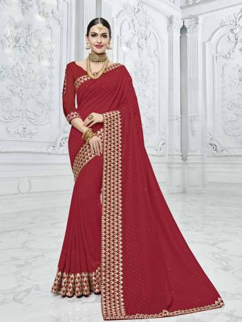 marvelously charming is what you will look at the next wedding gala wearing this beautiful maroon color silk fabrics saree. Ideal for party, festive & social gatherings. this gorgeous saree featuring a beautiful mix of designs. Its attractive color and designer heavy embroidered design, designer beautiful heavy blouse, beautiful floral design work over the attire & contrast hemline adds to the look. Comes along with a contrast unstitched blouse.