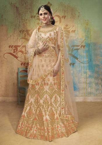 A Must Have Shade In Every Womens Wardrobe Is Here With This Heavy Designer Lehnega Choli In Peach Color. This Lehenga Choli Is Fabricated On Satin Silk Paired With Net fabricated Dupatta. All Its Fabric Are Soft Towards Skin And Easy To Carry All Day Long.