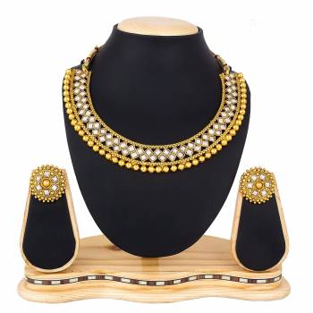 Here Is A Heavy Designer Necklace Set In Golden Color. This Necklace Set Can Be Paired With Any Colored Traditional Attire. Buy Now.