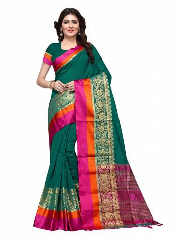 This Festive Season, Feel Comfortable And Look Beautiful Wearing This Lovely Cotton Silk Based Saree Beautified With Weave All. This Saree Is Light In Weight And easy To Carry All Day Long. Buy Now.