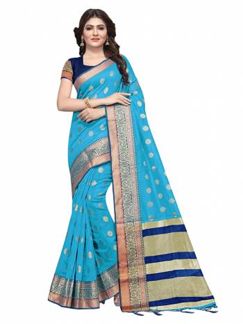 For Your Semi Casuals, Grab This Beautiful Saree Fabricated on Cotton Silk Paired With Cotton Silk fabricated Blouse. It Is Beautified With Weave Making The Saree More Attractive. Buy Now.