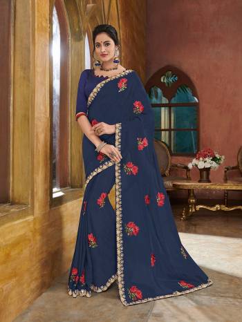 Get this amazing saree and look pretty like never before. wearing this Navy Blue color georgette saree. Ideal for party, festive & social gatherings. this gorgeous saree featuring a beautiful mix of designs. Its attractive color and heavy designer embroidered saree, full saree design saree, beautiful floral design all over work over the attire & contrast hemline adds to the look. Comes along with a contrast unstitched blouse.