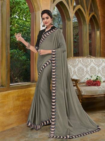 Presenting this grey color two tone chiffon pattern saree. Ideal for party, festive & social gatherings. this gorgeous saree featuring a beautiful mix of designs. Its attractive color and heavy designer embroidered saree, full saree design saree, beautiful floral design all over work over the attire & contrast hemline adds to the look. Comes along with a contrast unstitched blouse.