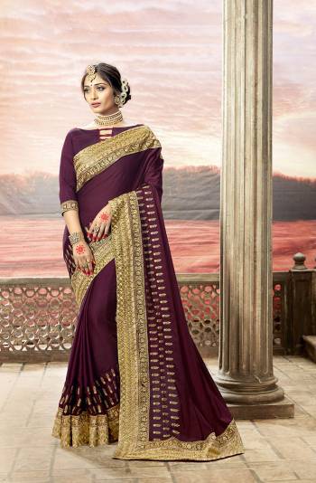 Add This Trending Shade To Your Wardrobe With This Designer Saree In Wine Color Paired With Wine Colored Blouse. This Saree Is Fabricated On Satin Silk Paired With Art Silk Fabricated Blouse. It Has Simple And Elegant Looking Embroidery. 