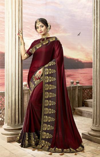 For A Royal Look, Grab This Designer Saree In Maroon Color Paired With Maroon Colored Blouse. This Is Satin Silk Based Paired With Art Silk Fabricated Blouse. It Is Easy To Drape And Durable. Buy This Designer Saree Now.