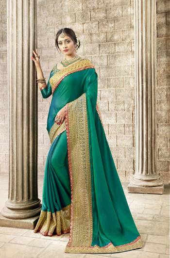 Simple And Elegant Patterned Designer Saree Is Here In Blue Color Paired With Blue Colored Blouse. This Saree Is Satin Silk Based Paired With Art Silk Fabricated Blouse. It Has Heavy Embroidered Lace Border Giving It An Attractive Look. 