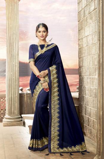 Enhance Your Personality Wearing This Designer Saree In Navy Blue Color Paired With Navy Blue Colored Blouse. This Saree And Blouse Are Silk based Beautified With Attractive embroidered Lace Border. 