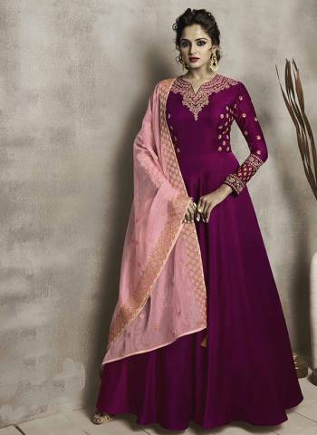 Bright And Visually Appealing Color Is Here With This Designer Floor Length Gown In Magenta Pink Color Paired With Baby Pink Colored Dupatta.  Its Top Is Fabricated On Satin Linen Paired With Orgenza Fabricated Dupatta. Both Its Fabrics Ensures Superb Comfort All Day Long. 