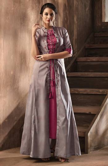 Rich And Elegant Color Pallete Is Here With This Designer Kurti In Pink Color Paired With Contrasting Grey Colored Jacket. This Top and Jacket Are Also Silk Based Which Gives A Rich Look To Your Personality. 