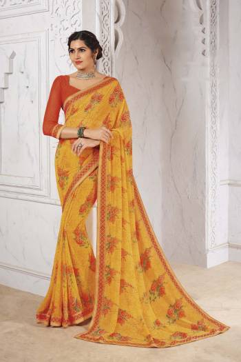 Pick Up This Very Pretty Printed Saree For Your Semi-Casuals. This Saree Is Fabricated On Georgette Beautified With Prints And Lace Border. It Is Durable, Light In Weight And Easy To Carry All Day Long. 