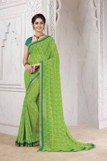 For Your Casual Or Semi-Casual Wear, Grab This Pretty Georgette Based Saree Beautified With Prints And Lace Border. Its Fabric Ensures Superb Comfort All Day Long And Also Durable. 