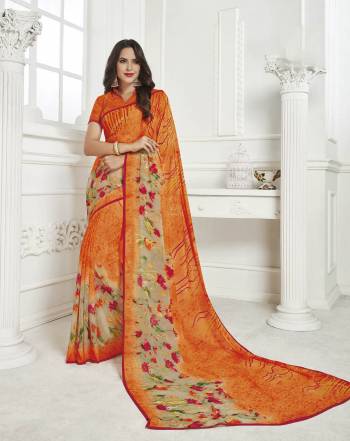 Simple And Elegant Looking Saree Is Here For Your Casual Wear. This Saree And Blouse are Fabricated On Georgette Beautified With Prints All Over. Buy Now.