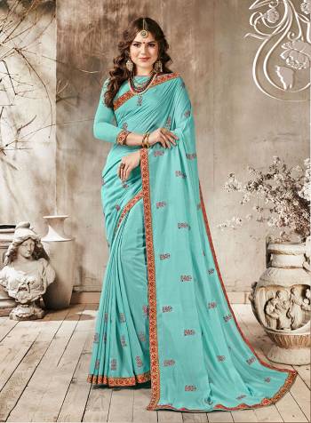 Grab This Very Pretty Colored Designer Saree In Turquoise Blue Color Paired With Turquoise Blue Colored Blouse. This Saree Is Fabricated On Georgette Paired With Art Silk Fabricated Blouse. Buy This Saree Now.