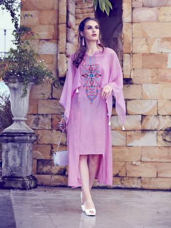 Enhance Your Personality Wearing This Designer Readymade Kurti In Pink Color Which Is Soft Fluid Silk Based. This Kurti has Unique Pattern Over The Hem With A Lovely Sleeve Pattern. This Kurti Is Available All Regular Sizes. Buy Now.