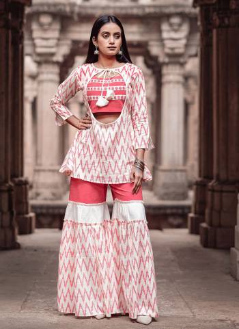 Grab This Very Pretty Designer Readymade Indo-Western Sharara Set In White And Peach Color. Its Top And Bottom Are Fabricated On Cambric Cotton Which Ensures Superb Comfort All Day Long. 