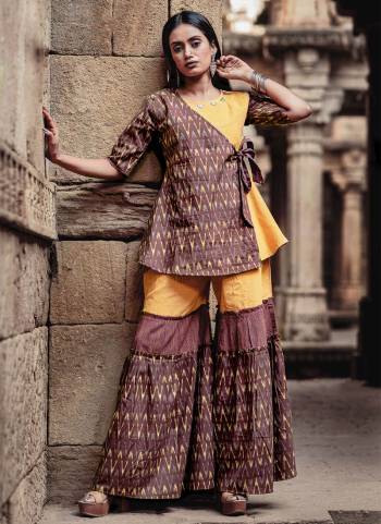 Enhance Your Personality Wearing This Designer Indo-Western Set Of Sharara. This Designer Piece In Brown And Yellow Is Fabricated On Cambric Cotton Beautified With Prints All Over. It Is Light Weight And Easy To Carry All Day Long. 