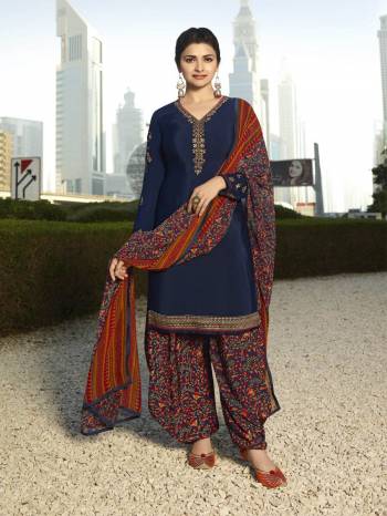 For A Bold And Beautiful Look, Grab This Designer Suit In Navy Blue Color Paired With Navy Blue Colored Bottom And Dupatta. Its Top And Bottom Are Crepe Based Paired With Chiffon Dupatta. It Is Light In Weight And Easy To Carry All Day Long. 