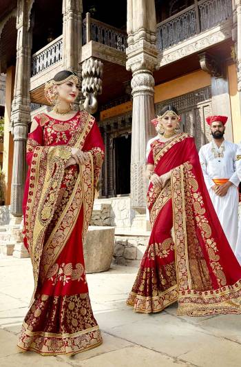 Adorn The Pretty Angelic Look Wearing This Designer Saree In Red Color Paired With Red Colored Blouse. This Saree Is Fabricated On Faux Georgette Paired With Art Silk Fabricated Blouse. Both The Fabrics Ensures Superb  Comfort All Day Long. 