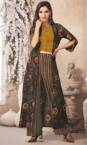 Here Is An Another Designer Indo Western Set In Mudturd Yellow Colored Top Paired With Multi Colored Bottom And Dark Brown Colored Jacket. Its Top And Bottom Are Fabricated On Rayon Paired With Muslin Fabricated Jacket. All Its Fabrics Ensures Superb Comfort All Day Long. 