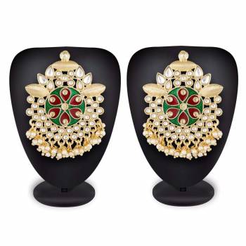 Grab This Beautiful And Attractive Pair Of Heavy Earrings Set In Golden Color. This Pretty Pair Is Beautified With Stone Work And Can Be Paired With Any Colored Traditional Attire. Buy Now.