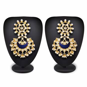 Grab This Beautiful And Attractive Pair Of Heavy Earrings Set In Golden Color. This Pretty Pair Is Beautified With Stone Work And Can Be Paired With Any Colored Traditional Attire. Buy Now.