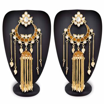 For An Attractive Look, Pair up This Beautiful Pair Of Earrings In Golden Color Which Can Be Paired With Any Colored Ethnic Attire. It Is Light In Weight And Easy To Carry All Day Long. 