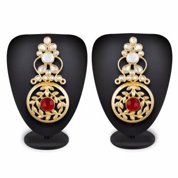 Grab This Beautiful And Attractive Pair Of Heavy Earrings Set In Golden Color. This Pretty Pair Is Beautified With Stone Work And Can Be Paired With Any Colored Traditional Attire. Buy Now.