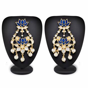 Grab This Beautiful And Attractive Pair Of Heavy Earrings Set In Golden Color. This Pretty Pair Is Beautified With Stone Work And Can Be Paired With Any Colored Traditional Attire. Buy Now.