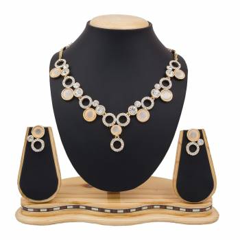 For A Girly Elegant Look, Grab This Beautiful Designer Necklace Set In Pretty Rose Gold Color. This Necklace Set Is Beautified With Diamond Work. Also This Can Be Paired With Colored Indo-Western Or Ethnic Attire. Buy Now.