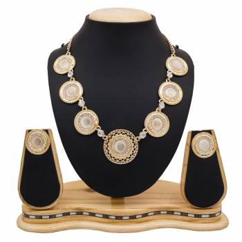 For A Girly Elegant Look, Grab This Beautiful Designer Necklace Set In Pretty Rose Gold Color. This Necklace Set Is Beautified With Diamond Work. Also This Can Be Paired With Colored Indo-Western Or Ethnic Attire. Buy Now.