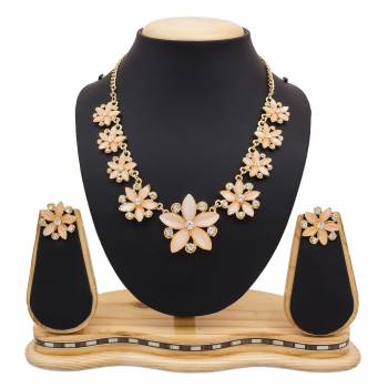 For A Girly Elegant Look, Grab This Beautiful Designer Necklace Set In Pretty Rose Gold Color. This Necklace Set Is Beautified With Diamond Work. Also This Can Be Paired With Colored Indo-Western Or Ethnic Attire. Buy Now.