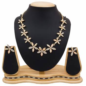 For A Girly Elegant Look, Grab This Beautiful Designer Necklace Set In Pretty Rose Gold Color. This Necklace Set Is Beautified With Diamond Work. Also This Can Be Paired With Colored Indo-Western Or Ethnic Attire. Buy Now.