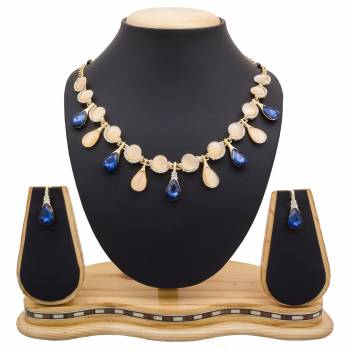 For A Girly Elegant Look, Grab This Beautiful Designer Necklace Set In Pretty Rose Gold Color. This Necklace Set Is Beautified With Diamond Work. Also This Can Be Paired With Colored Indo-Western Or Ethnic Attire. Buy Now.