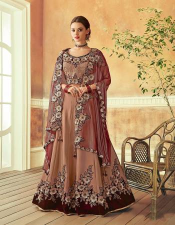 Bring in elegance of the yesteryears and look conventionally beautiful in this abstact floral embroidered lehenga . 