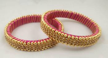 Get This Lovely Pair Of Bangles To Wear It With Your Ethnic Wear. This Pretty Pair Can Be Wore Single Or Can Be Mixed With Other Simple Bangles For Heavy Look. 