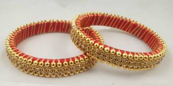 Get This Lovely Pair Of Bangles To Wear It With Your Ethnic Wear. This Pretty Pair Can Be Wore Single Or Can Be Mixed With Other Simple Bangles For Heavy Look. 