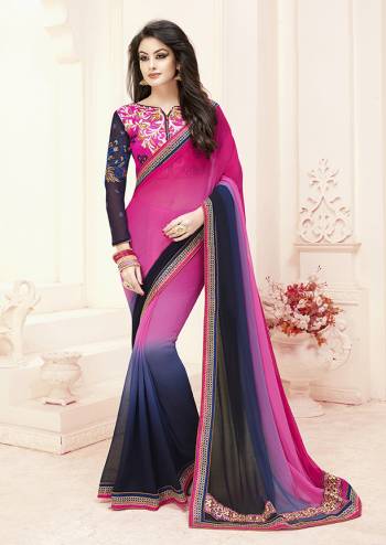 Shine Bright Wearing This Designer Saree In Magenta Pink And Navy Blue Color Paired With Navy Blue Colored Blouse. This Saree IS Georgette Based Paired With Art Silk And Georgette Fabricated Blouse. 