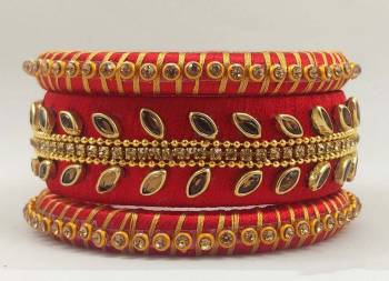 Here Is A Beautiful set Of contrasting Colored Bangles Made With Resham Thread And Stone Work. You Can Pair It Up With Either Of The Color From Both The Bagles. Also You Can Add Up With Pretty Simple Bagles To Make It As A Heavy Set. 