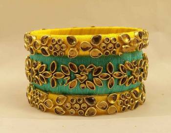 Here Is A Beautiful set Of contrasting Colored Bangles Made With Resham Thread And Stone Work. You Can Pair It Up With Either Of The Color From Both The Bagles. Also You Can Add Up With Pretty Simple Bagles To Make It As A Heavy Set. 