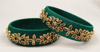 Get This Lovely Pair Of Bangles To Wear It With Your Ethnic Wear. This Pretty Pair Can Be Wore Single Or Can Be Mixed With Other Simple Bangles For Heavy Look. 