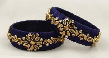 Get This Lovely Pair Of Bangles To Wear It With Your Ethnic Wear. This Pretty Pair Can Be Wore Single Or Can Be Mixed With Other Simple Bangles For Heavy Look. 