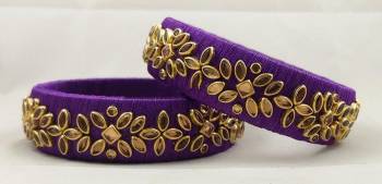 Get This Lovely Pair Of Bangles To Wear It With Your Ethnic Wear. This Pretty Pair Can Be Wore Single Or Can Be Mixed With Other Simple Bangles For Heavy Look. 