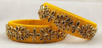 Get This Lovely Pair Of Bangles To Wear It With Your Ethnic Wear. This Pretty Pair Can Be Wore Single Or Can Be Mixed With Other Simple Bangles For Heavy Look. 