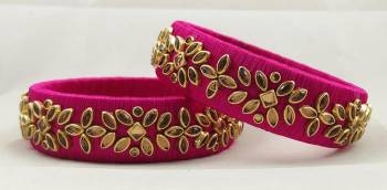 Get This Lovely Pair Of Bangles To Wear It With Your Ethnic Wear. This Pretty Pair Can Be Wore Single Or Can Be Mixed With Other Simple Bangles For Heavy Look. 