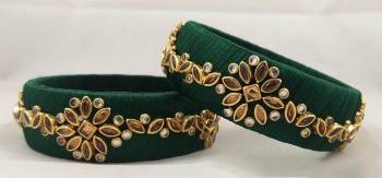 Get This Lovely Pair Of Bangles To Wear It With Your Ethnic Wear. This Pretty Pair Can Be Wore Single Or Can Be Mixed With Other Simple Bangles For Heavy Look. 