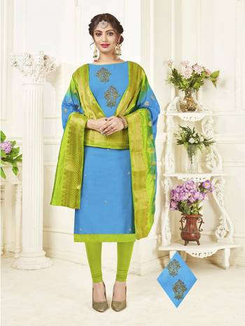 Pretty Simple Dress Material Is Here In Blue Colored Top Paired With Contrasting Parrot Green Colored Bottom And Blue And Green Shaded Dupatta. This Dress Material Is Cotton Based Paired With Banarasi Art Silk Dupatta. 