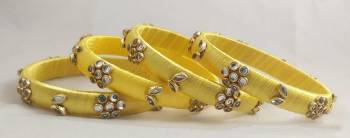 Grab This Very Pretty Set Of Four Bangles To Pair Up With Your Ethnic Wear, Also You Can Pair It Up With Same Or Any Contrasting Colored Attire. This Pretty set Is Available In All Sizes. 